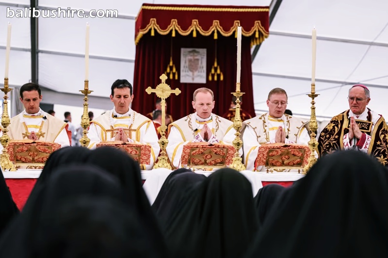 the new SSPX bishops, Marc Hanappier, Michel Poinsinet de Sivry, Michael Goldade and Pascal Schreiber, stand next to their leader, Bernard Fellay, in Écône, Switzerland
